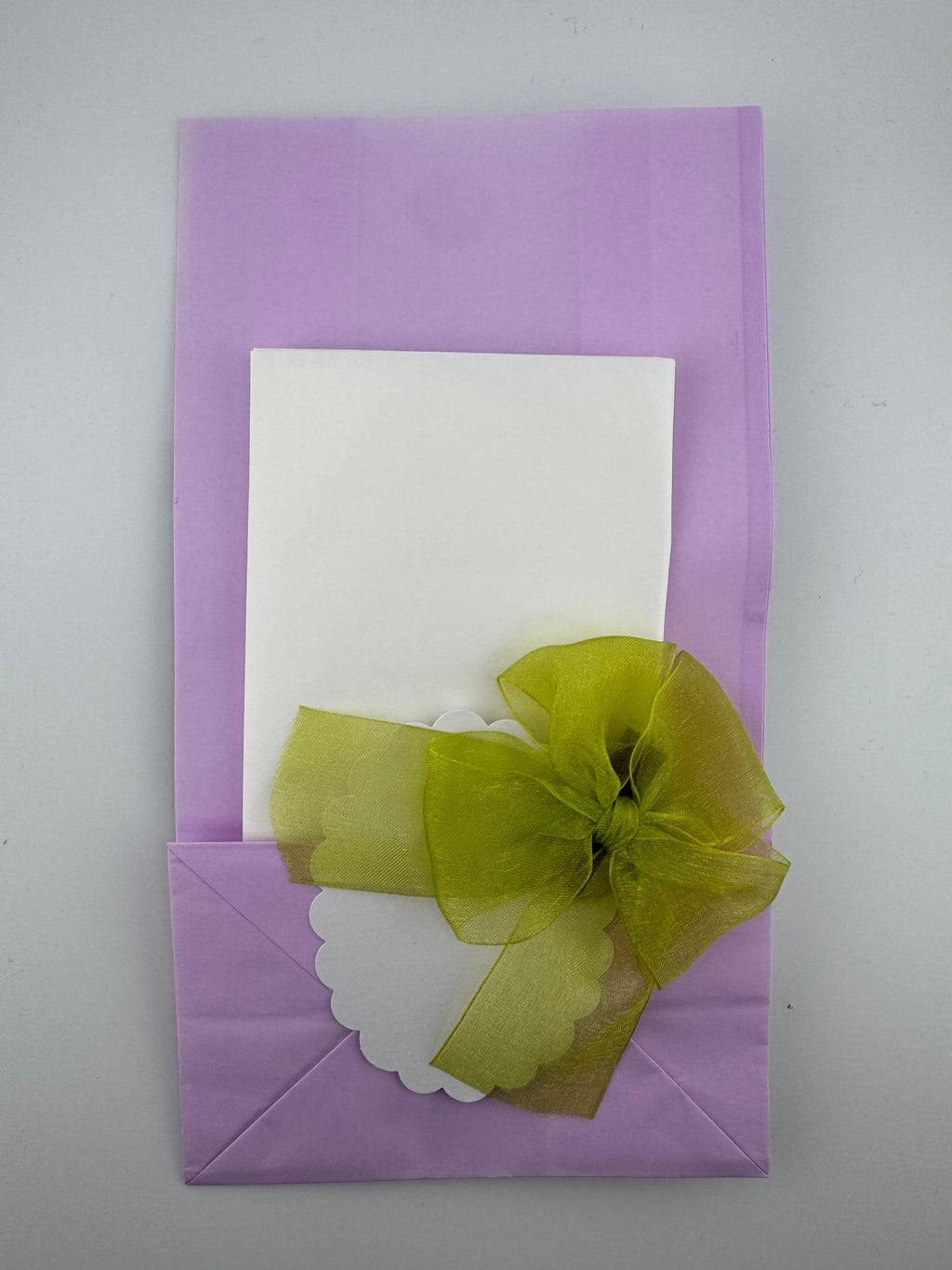 Hand Crafted paper bag purple and daisies with tissue paper and card.
