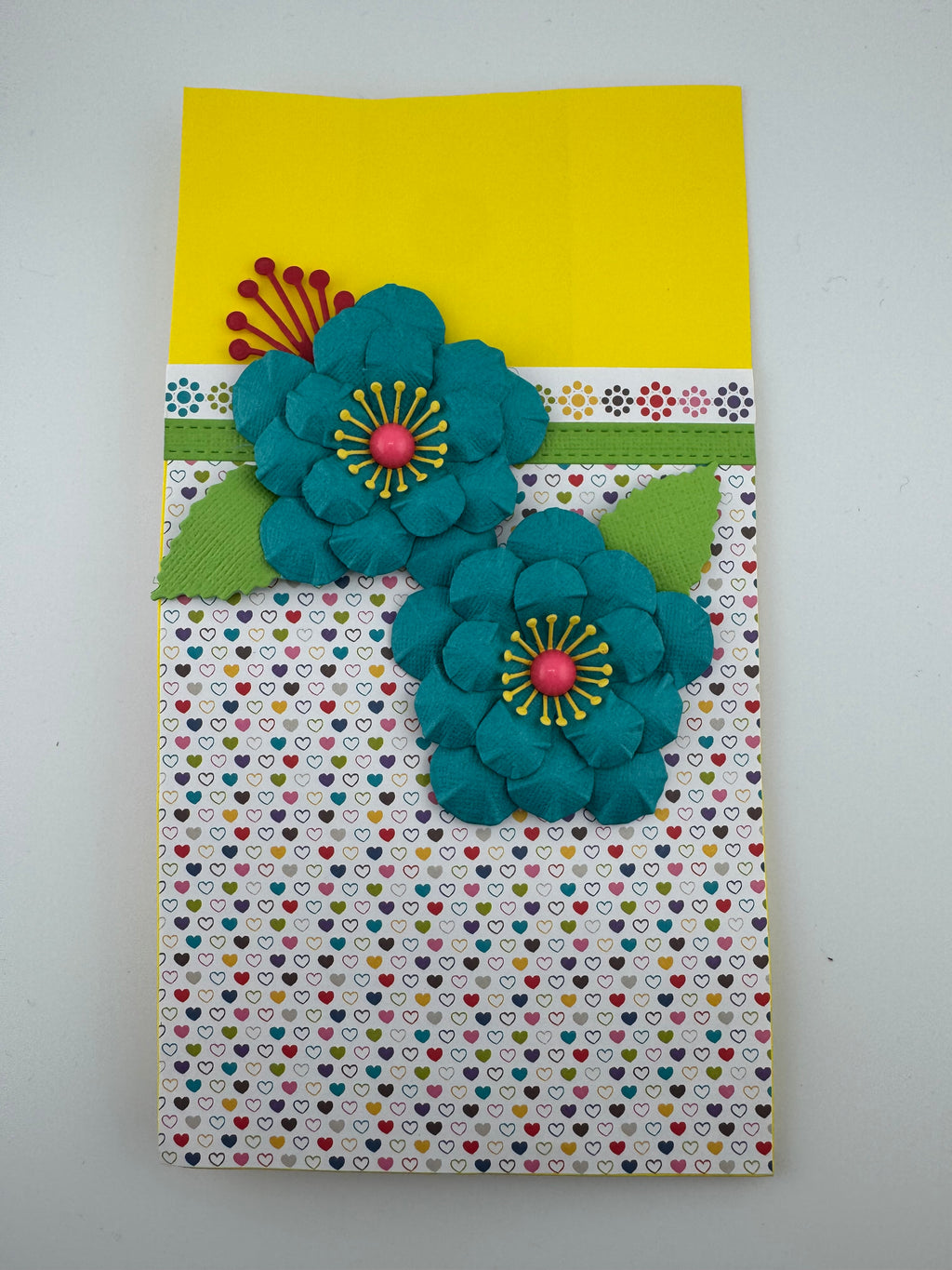 Hand Crafted paper bag yellow green, turcoise flowers with tissue paper and card.