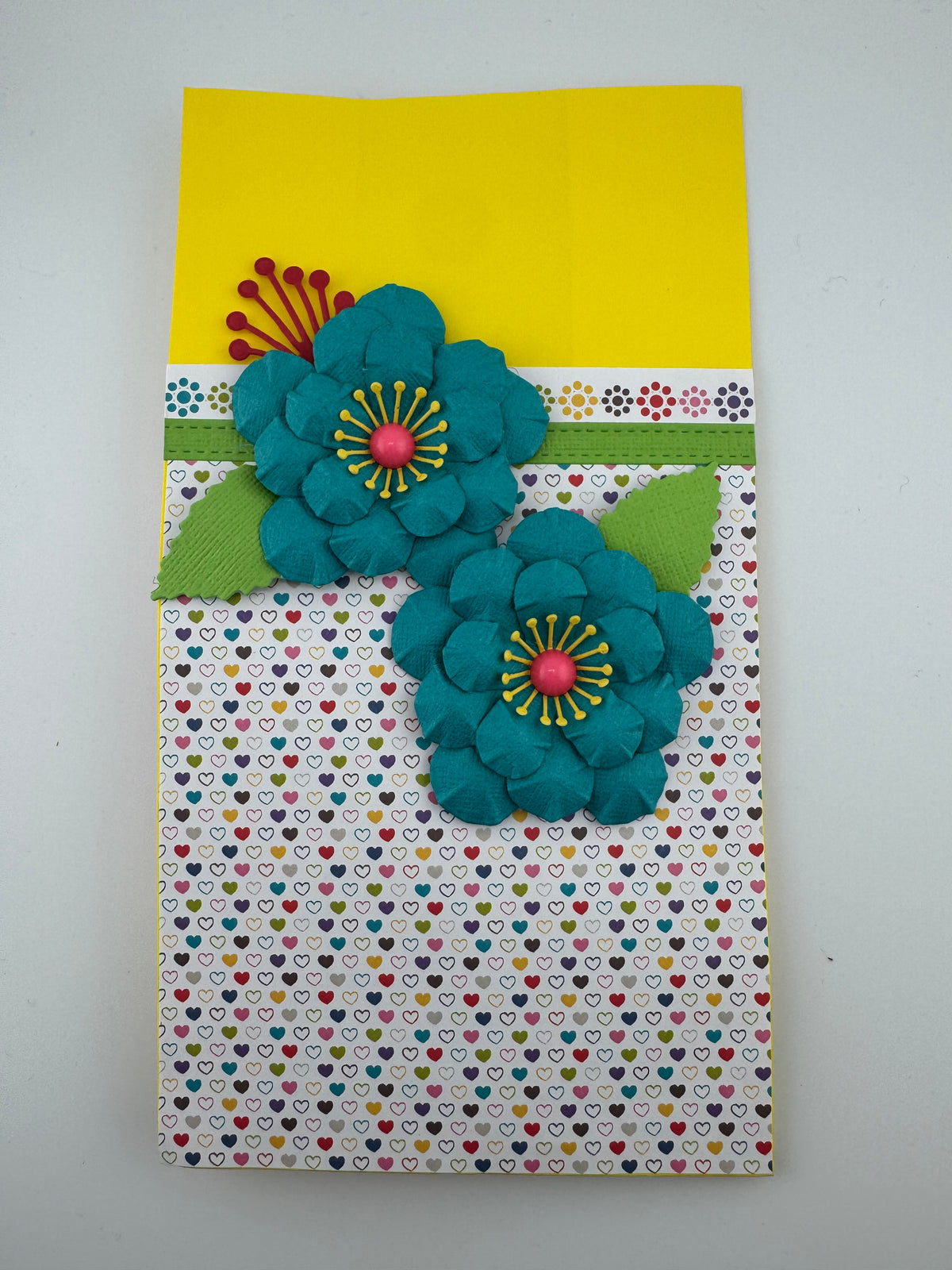 Hand Crafted paper bag yellow green, turcoise flowers with tissue paper and card.