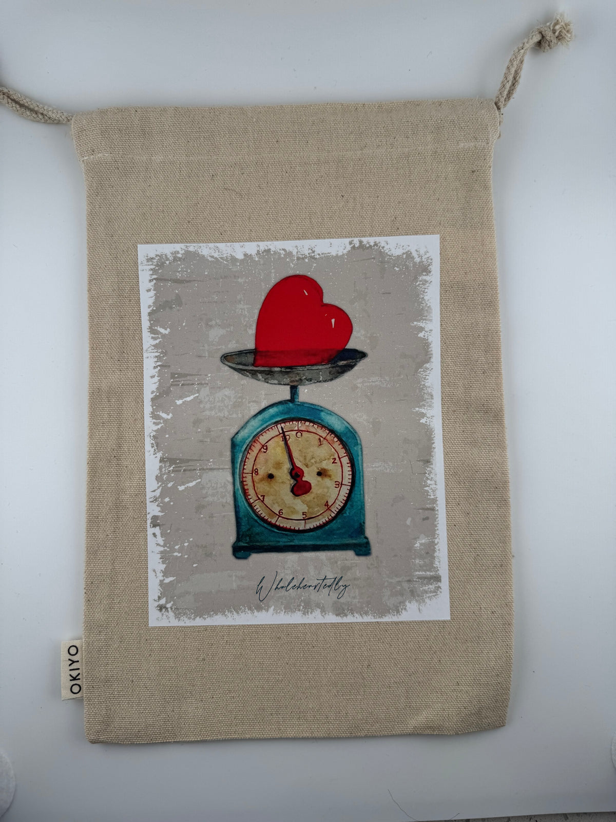 Canvas drawstring bag - heart on scale