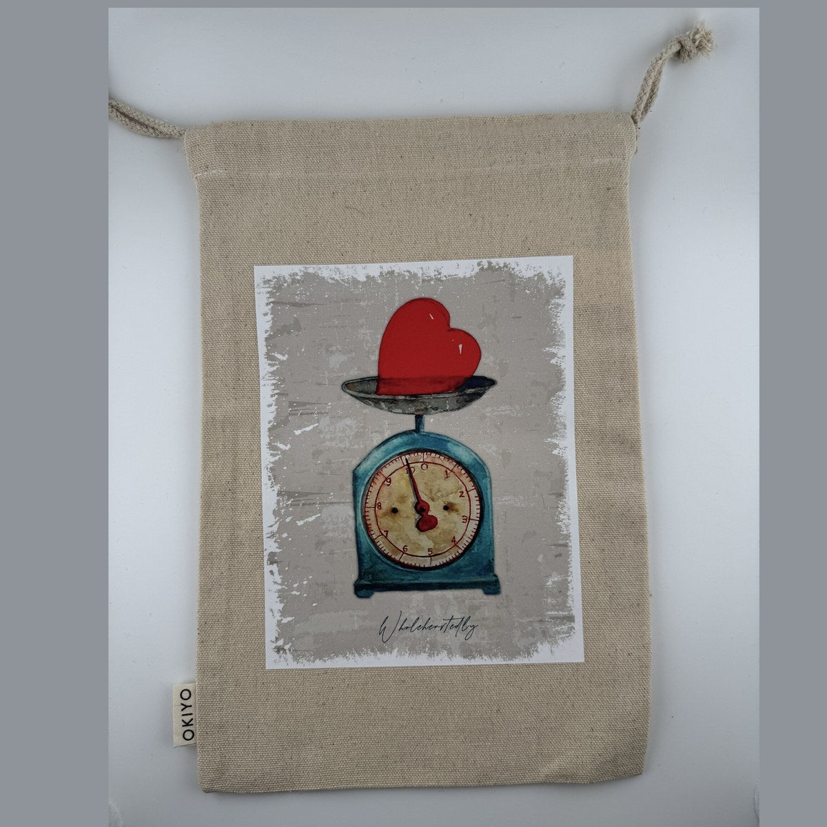 Canvas drawstring bag - heart on scale